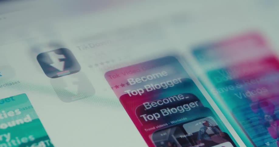 A closeup rapid scroll through various tiktokrelated applications in an app store on a tablet screen highlights analytics and content management