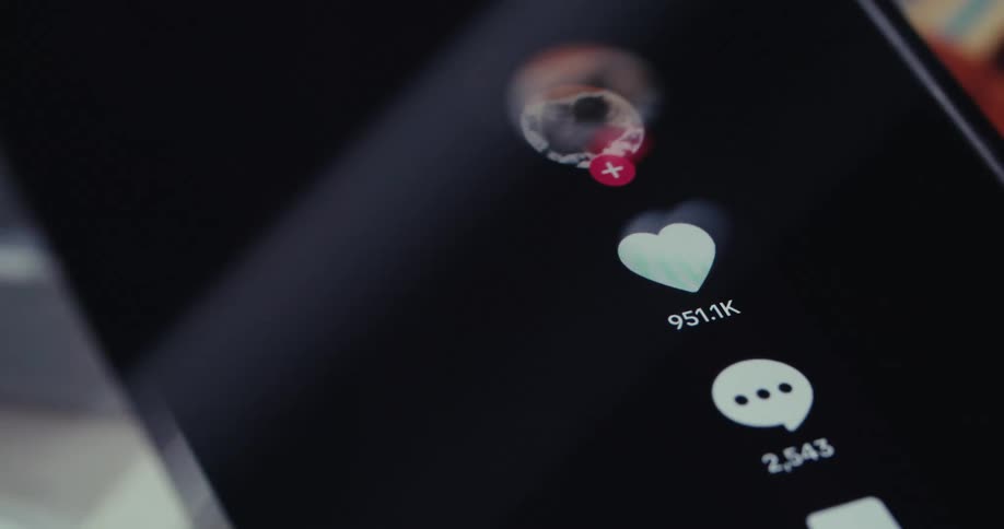 A finger scrolls down a screen