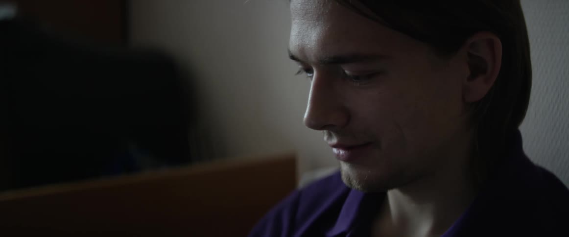 Close up of a man's face smiling