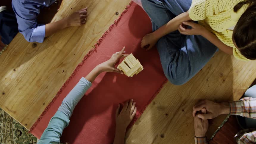 Blocks are stacked and they all fall over