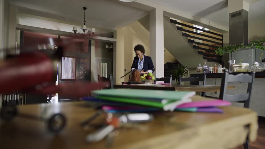 A woman finders her keys in the home