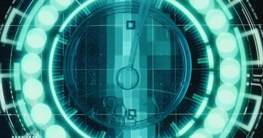 The futuristic device has spinning lights around the petri dish