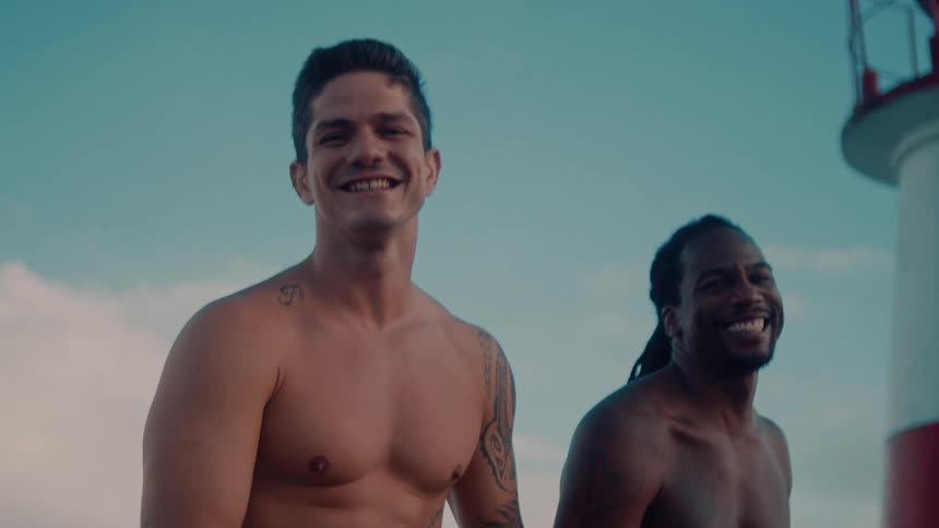 Two friends are smiling and enjoying the outdoor weather