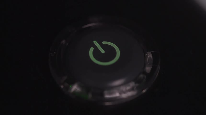 Finger clicking a button and activating an electronic device