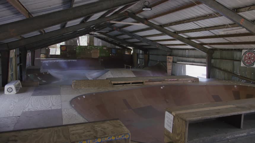 Interior design of a skate park with covered ramps