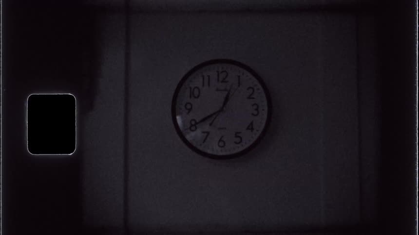 Analog clock on a white wall