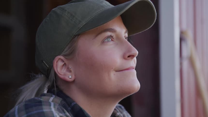 A woman smiling