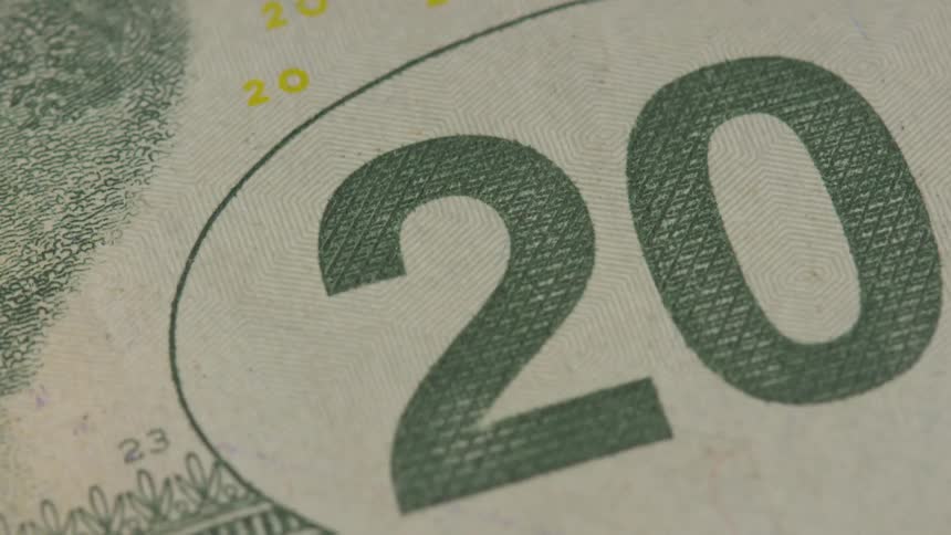 Money flashes up close in different areas
