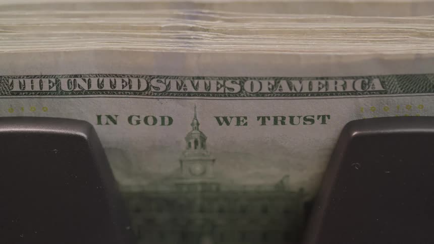 Bills are stacked together