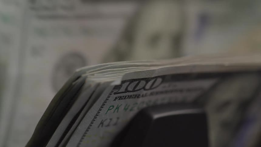 Bills are stacked together
