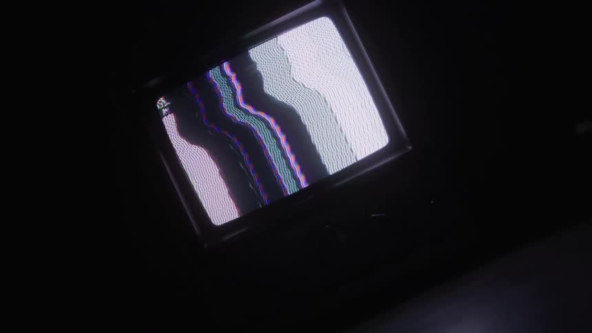 Retro tv with no signal in a dark room
