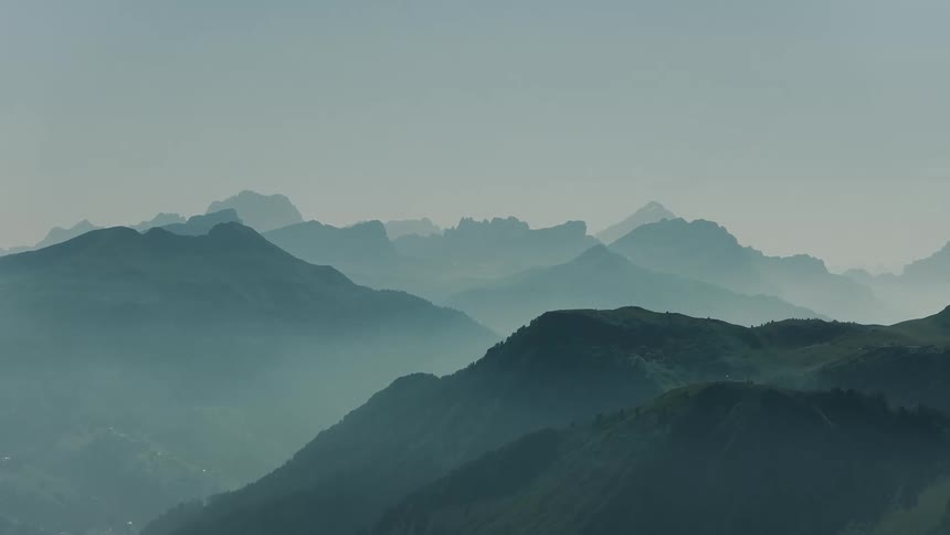 Aerial View of Mountain Layers Covered in Fog
