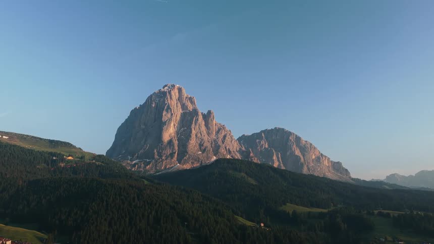 Mountain Landscape Under a Cloudless Blue Sky at Dawn