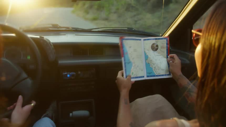 Two women are having fun on a road trip