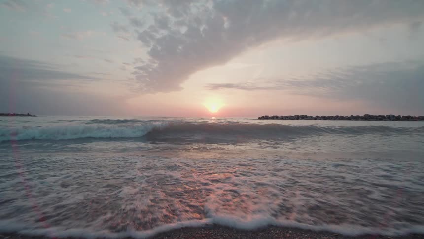 The tide is moving over the shore