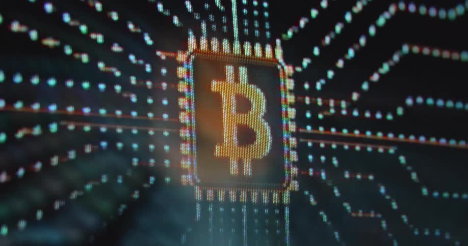 An animated glowing bitcoin symbol positioned centrally on a circuit board background with lines of data flowing towards it and outwards suggesting digital transactions and network activity of the decentralized BTC network