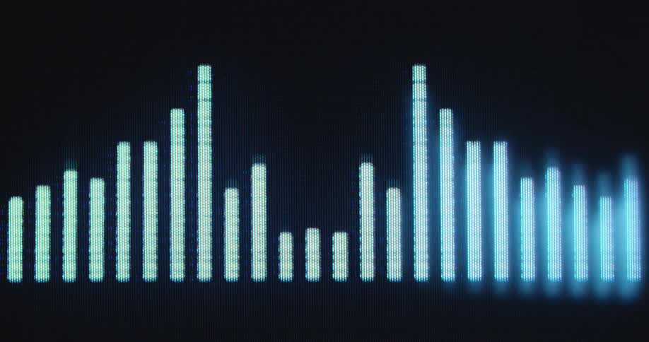 Audio studio voice recording sound wave on a computer screen with different frequencies and tones as the audio level indicator bars of the equalizer interface move up and down to the music beat or song