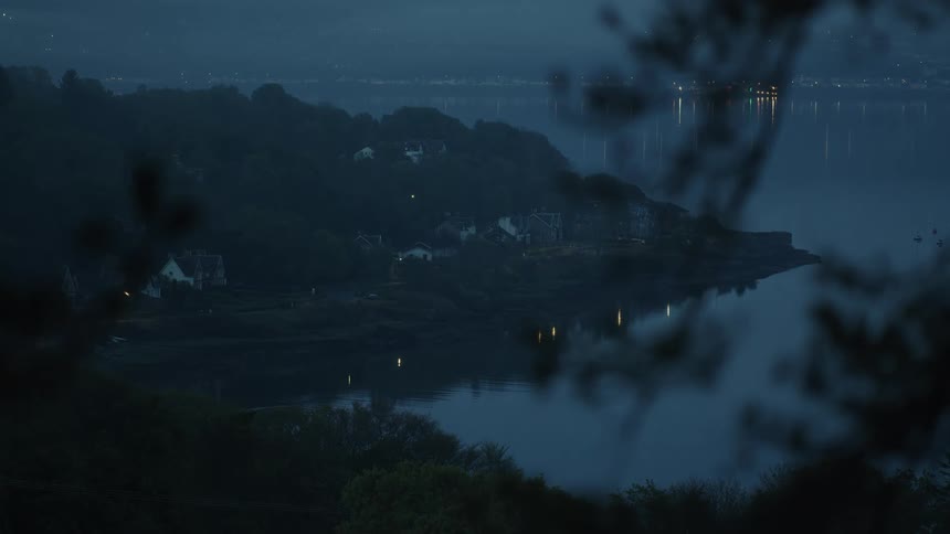 Heavy fog is on the homes by the water