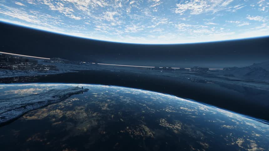 Person stands on the shore of a lake reflecting a nearby planet