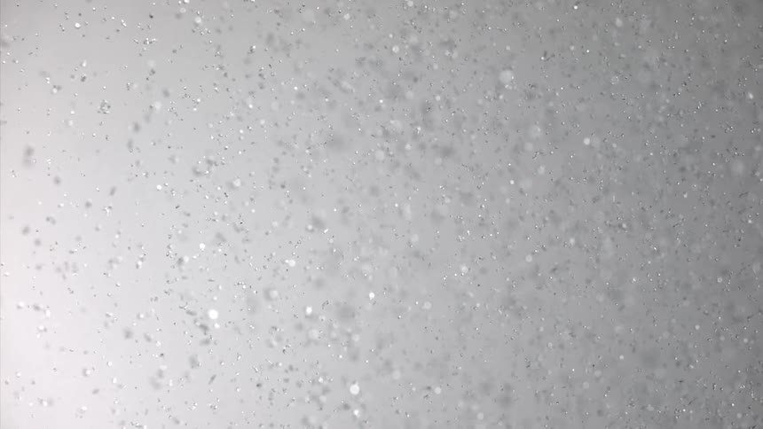 Shiny droplets against an abstract blurred background