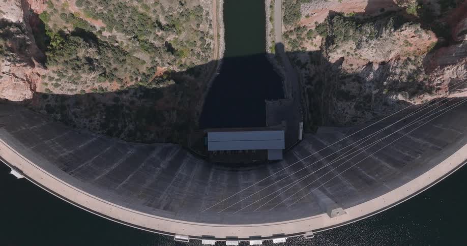 Dam effectively controlling flow from a lake to a river