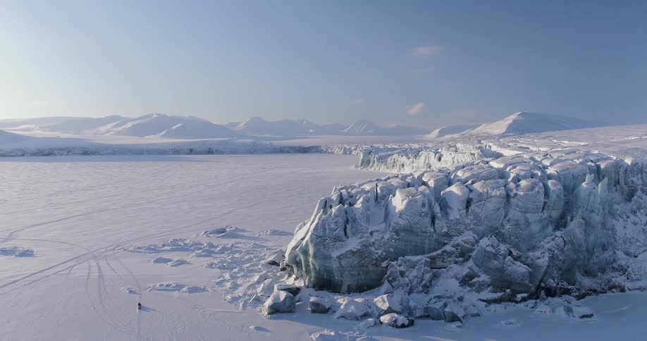 Snow and ice cover the landscape