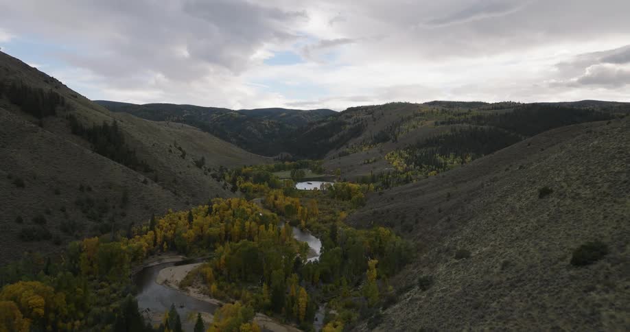 A small stream is between the hills