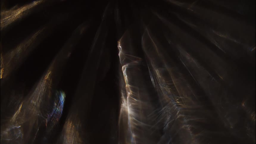 A cave reflecting faint light