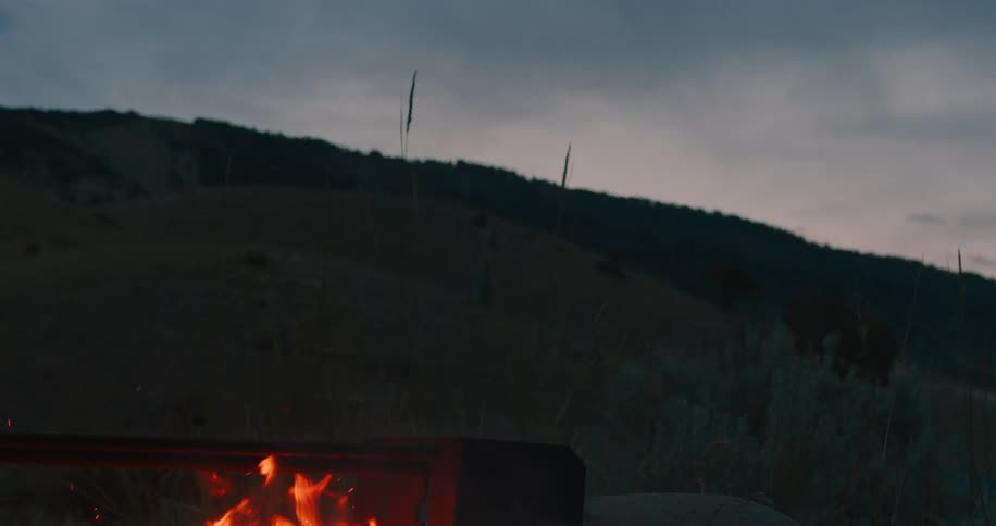 A bonfire is before the mountain