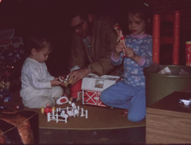 Children play with toys with their father