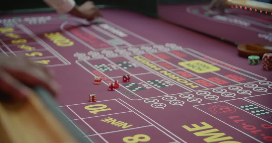 People playing at a craps table