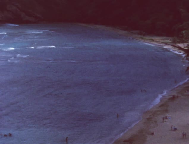 Waves crash ashore at a beach