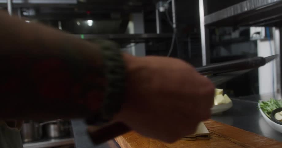 Chef sharpening a knife