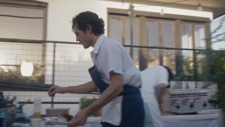 Men are cooking in the yard