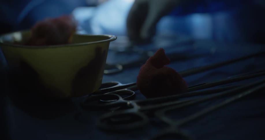 Close up of medical supplies including surgical scissors