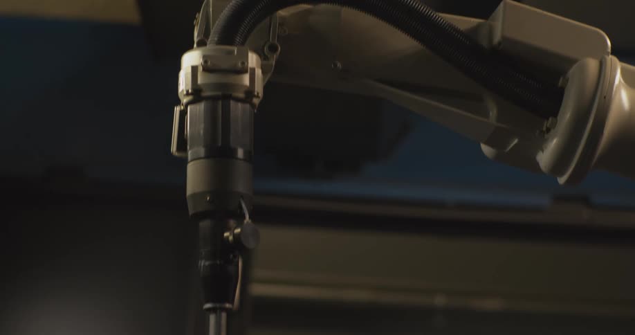 Mechanical and robotic arm in operation