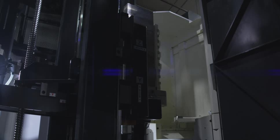 The machine spins and moves down