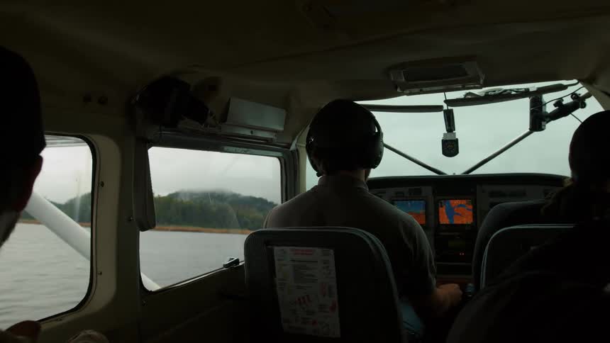 The plane is taking off on the water