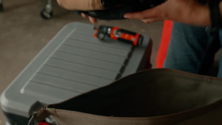 Person waiting for an object inside a bag