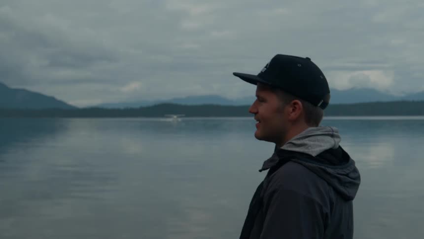 Man in cap by the lake