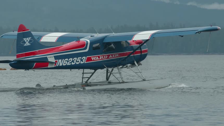 Water plane taking off from the sea