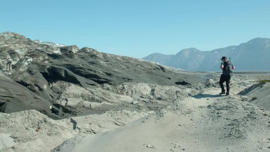 Man walking in a natural mountain area