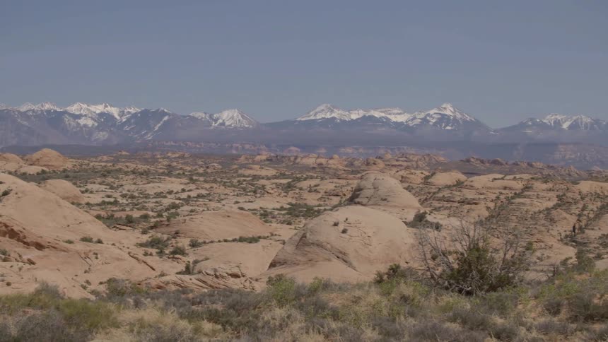 Desert expanse with mountains in the background