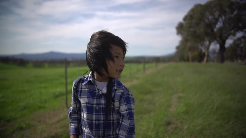 A person's hair blowing in the wind