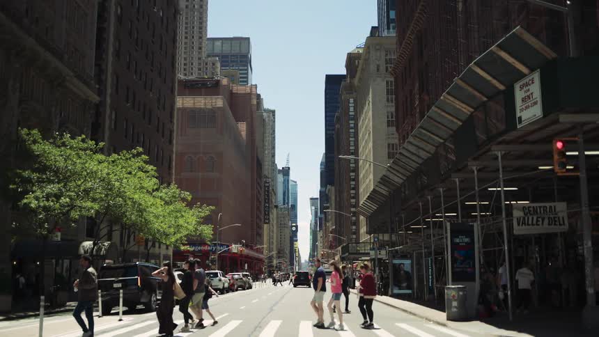 Pedestrians walking on an urban street in a metropolis