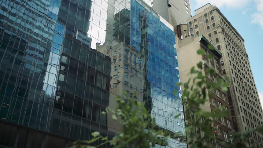 Sunlight is reflecting on the downtown skyscraper buildings