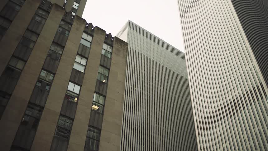 Tall skyscraper buildings in a city during the spring season