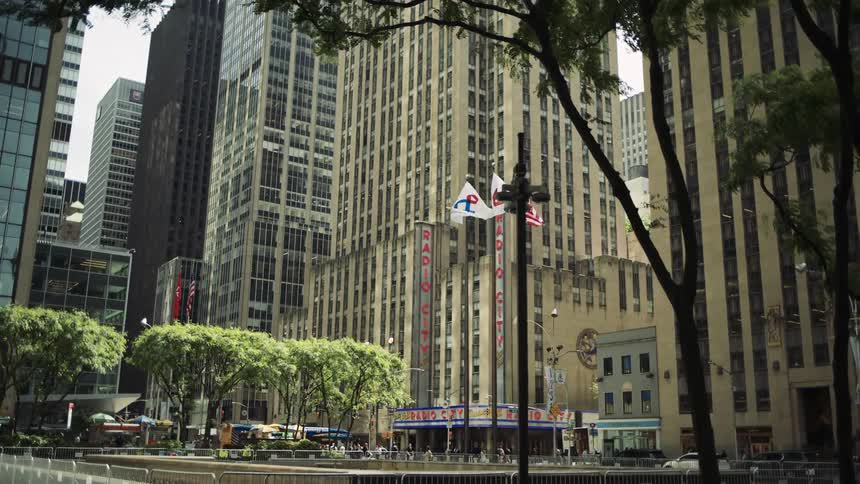 Square in the middle of an urban city with commercial skyscrapers