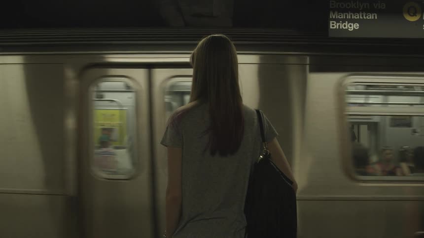 A person waiting for a train