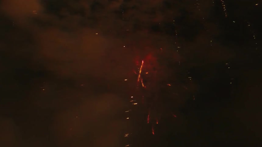 A lot of fireworks shooting and sparking in the air